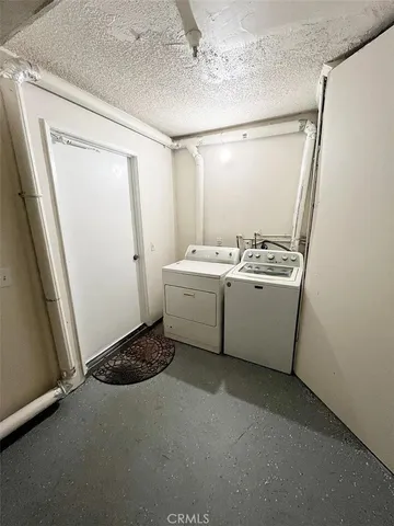 a view of empty room with windows