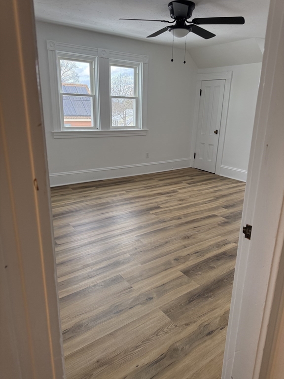 120 Graham Street, Unit 3 Gardner, MA 01440 - Photo 8 of 13 a view of room with window and hardwood floor
