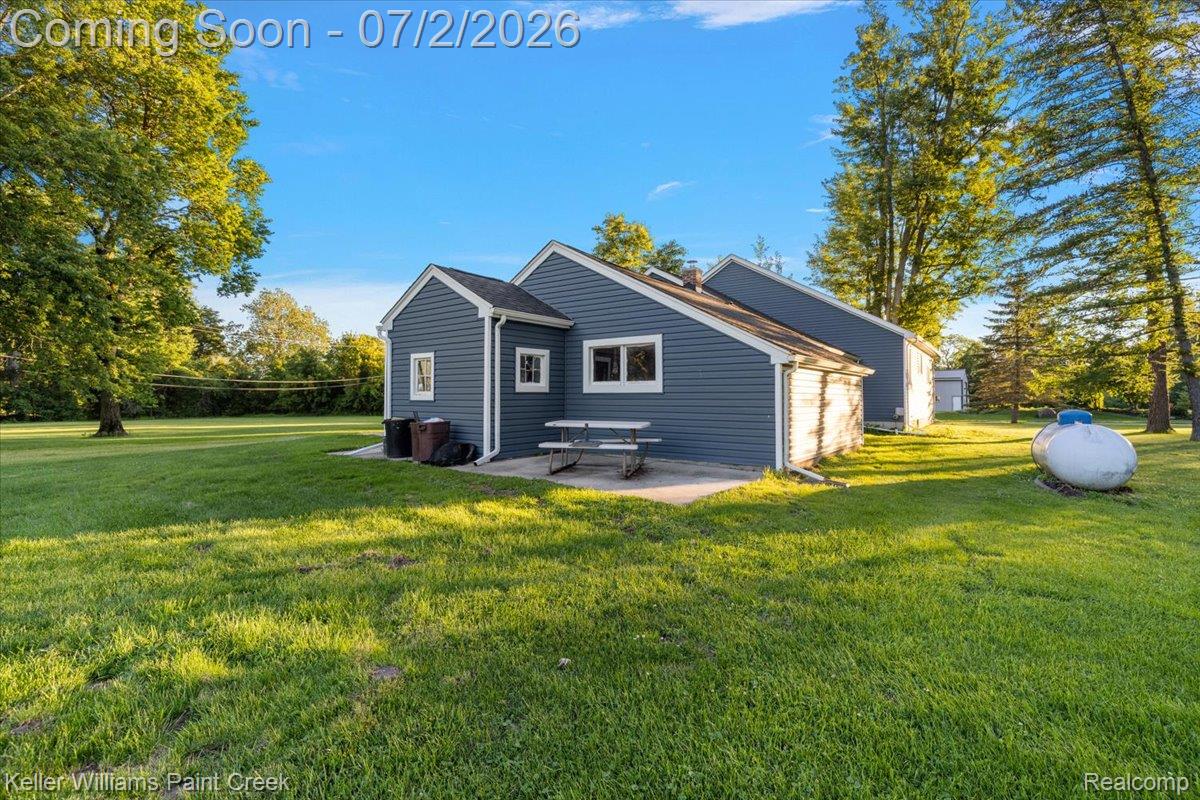 54230 Card Road Macomb, MI 48042 - Photo 5 of 73 Expansive grassy yard with mature trees
