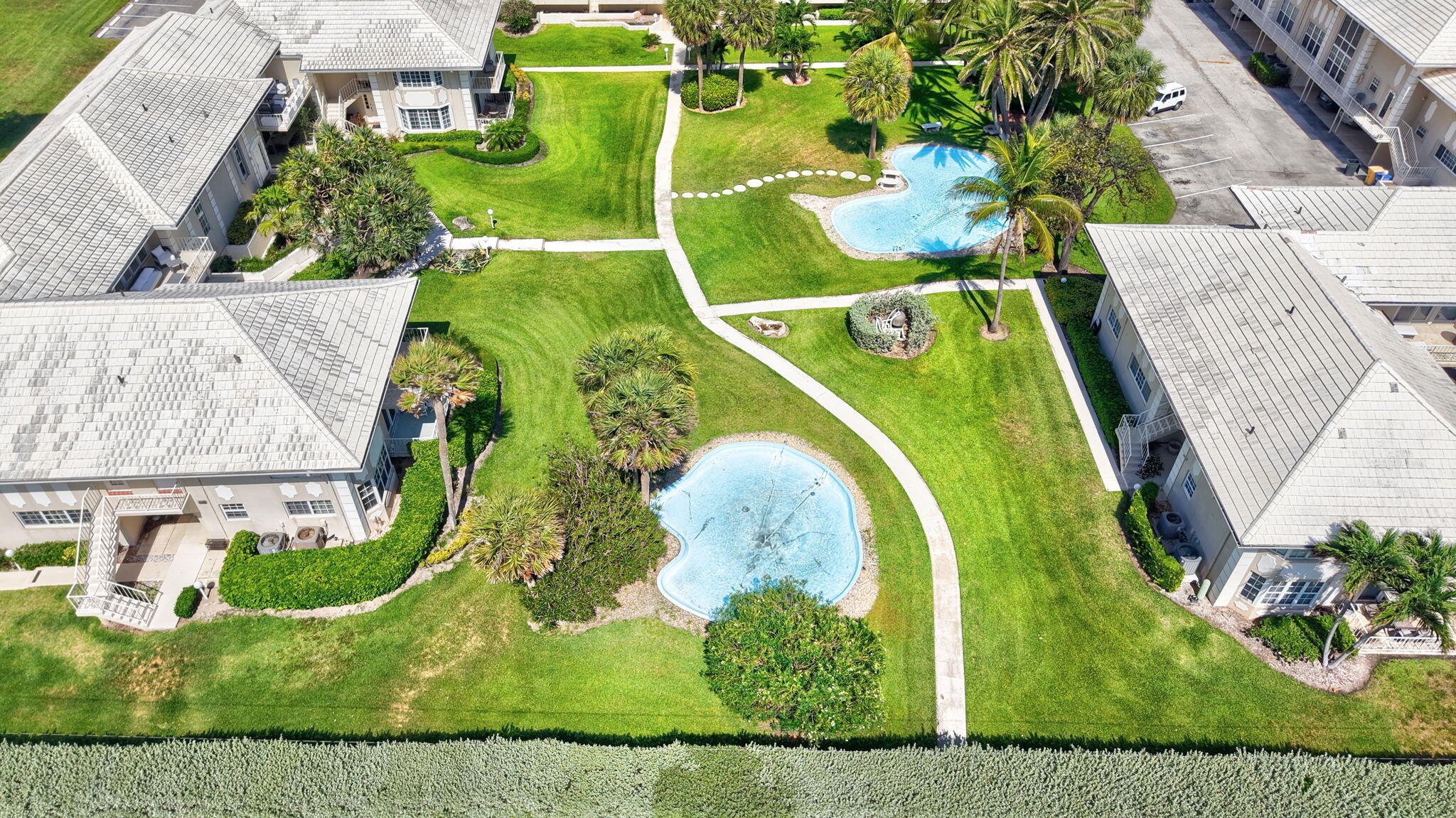 950 De Soto Road, Unit 5A Boca Raton, FL 33432 - Photo 69 of 98 an aerial view of a swimming pool