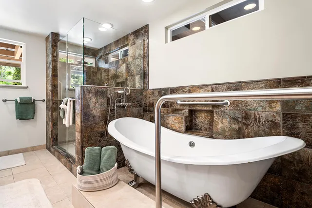 a view of kitchen with furniture and refrigerator