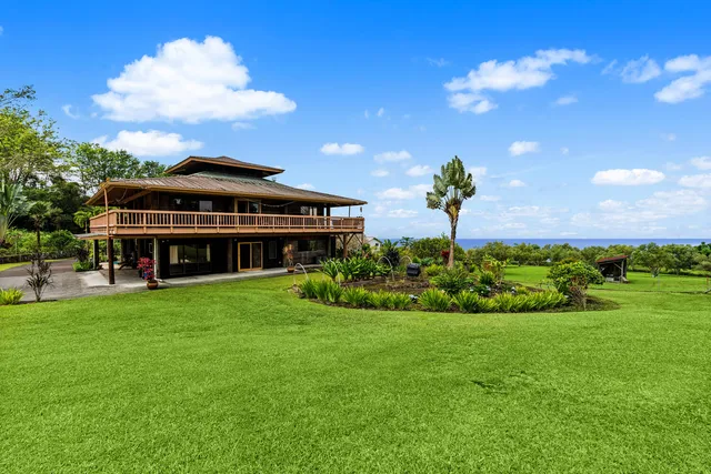 a view of a house with a garden