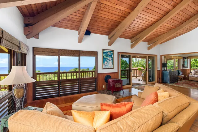 a outdoor space with patio lots of furniture and iron stairs