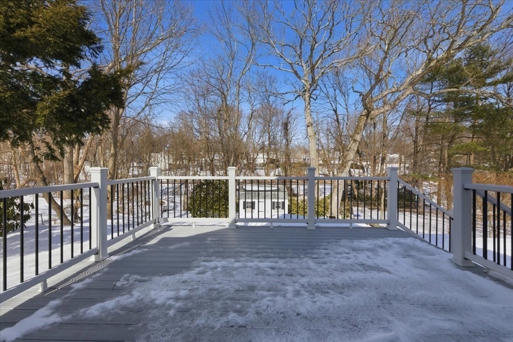 72 Crane Street Dedham, MA 02026 - Photo 29 of 42 a view of a house with a fence