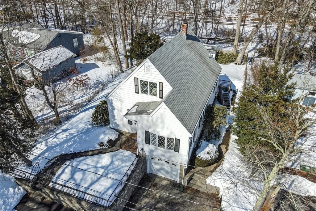 72 Crane Street Dedham, MA 02026 - Photo 32 of 42 an aerial view of a house with a yard