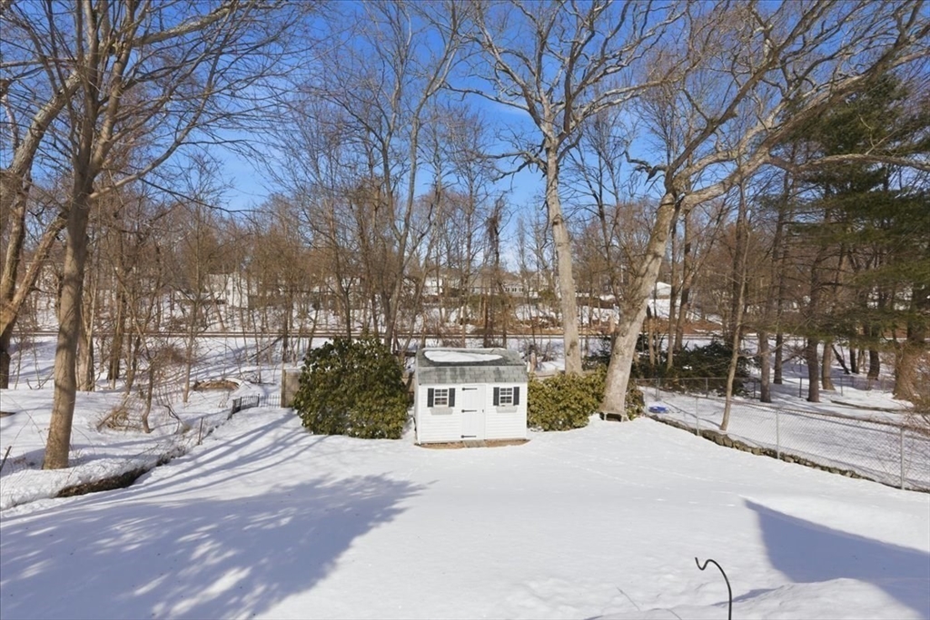 72 Crane Street Dedham, MA 02026 - Photo 33 of 42 a building with trees in front of it