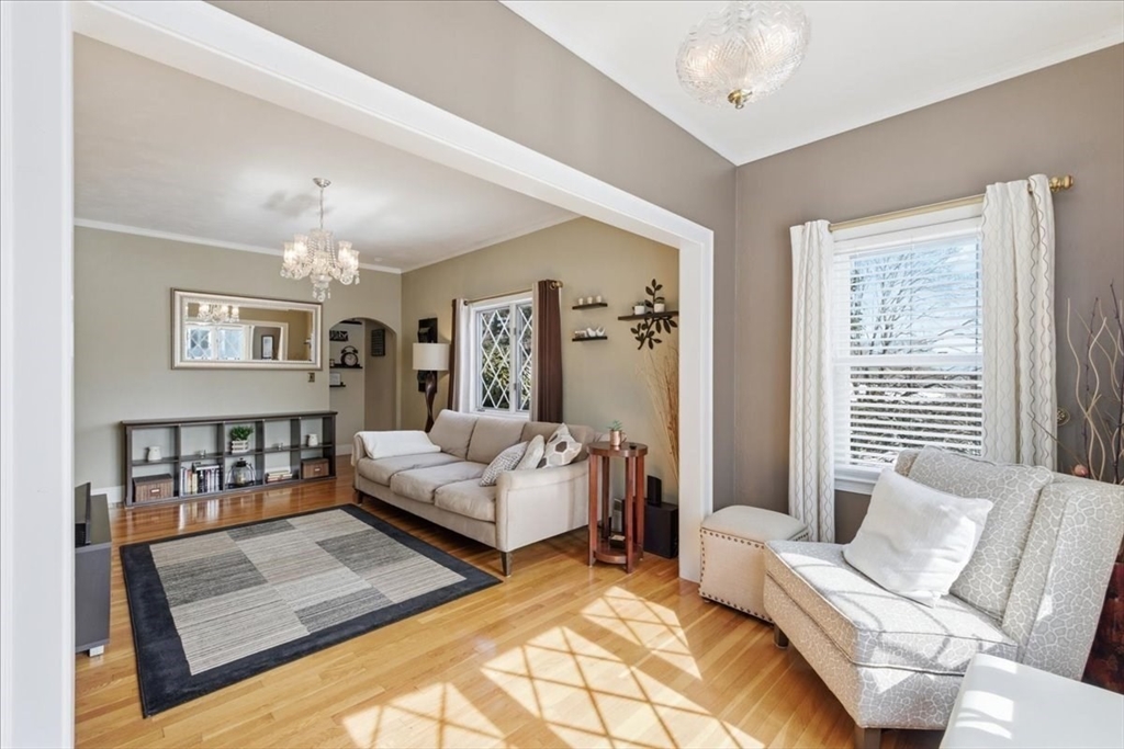 72 Crane Street Dedham, MA 02026 - Photo 4 of 42 a living room with furniture and a window