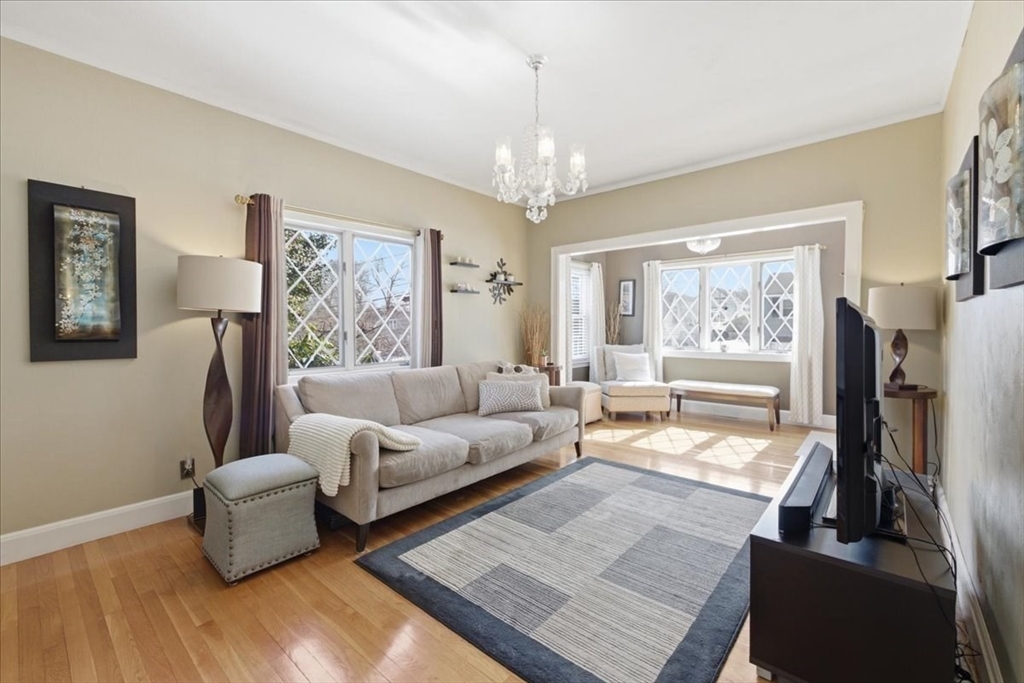 72 Crane Street Dedham, MA 02026 - Photo 5 of 42 a living room with furniture and a flat screen tv