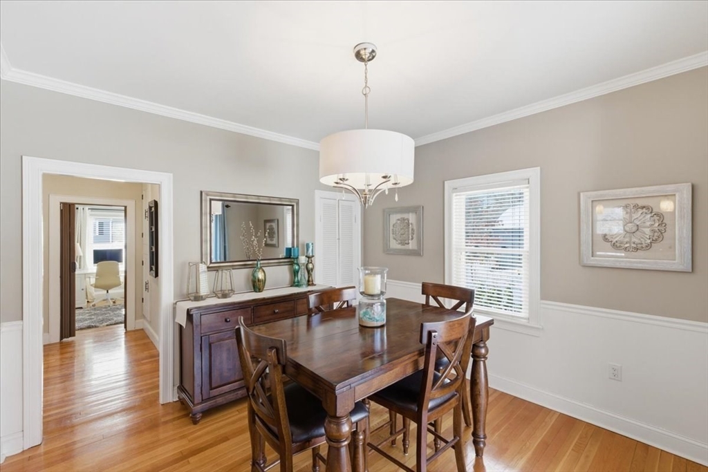 72 Crane Street Dedham, MA 02026 - Photo 10 of 42 a view of a dining room with furniture window and wooden floor