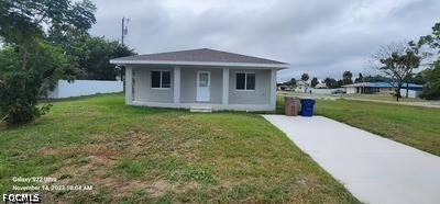 802 East Jasmine Road Lehigh Acres, FL 33936 - Photo 1 of 17