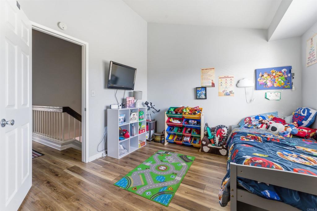 2373 Kings View Circle Spring Valley, CA 91977 - Photo 16 of 28 a children room with toys and a couch