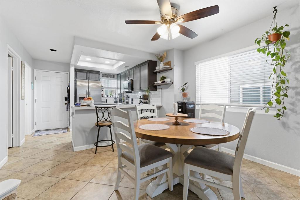2373 Kings View Circle Spring Valley, CA 91977 - Photo 6 of 28 a dining room with furniture and window