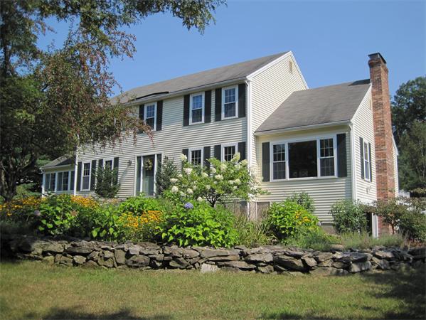 6 Houghton's Mill Road Lunenburg, MA 01462 - Photo 1 of 28 a front view of a house with a garden