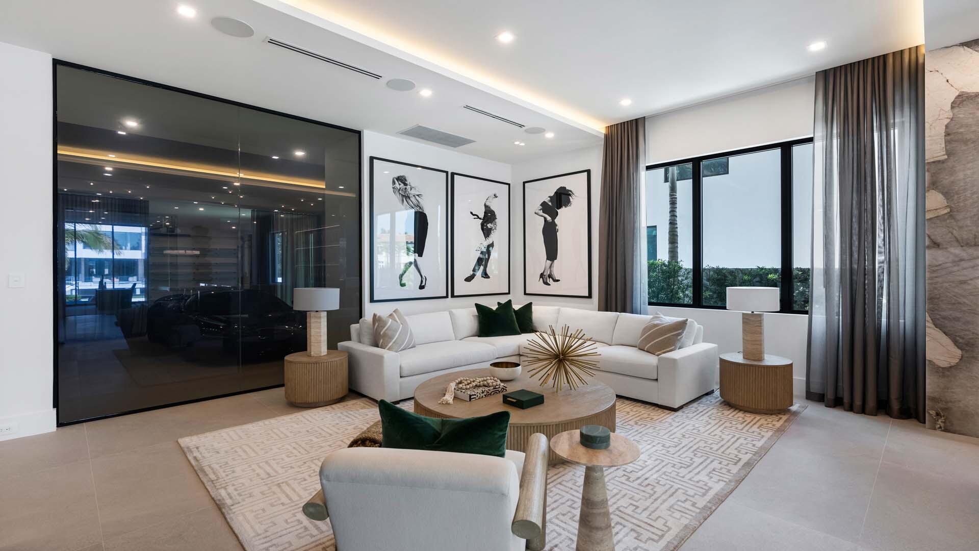 207 Coconut Palm Road Boca Raton, FL 33432 - Photo 19 of 62 a living room with furniture and a large window