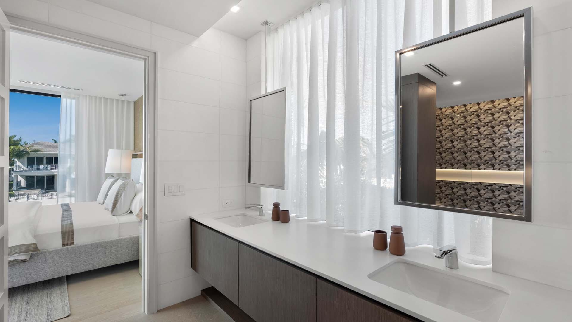 207 Coconut Palm Road Boca Raton, FL 33432 - Photo 43 of 62 a bathroom with a double vanity sink mirror and shower