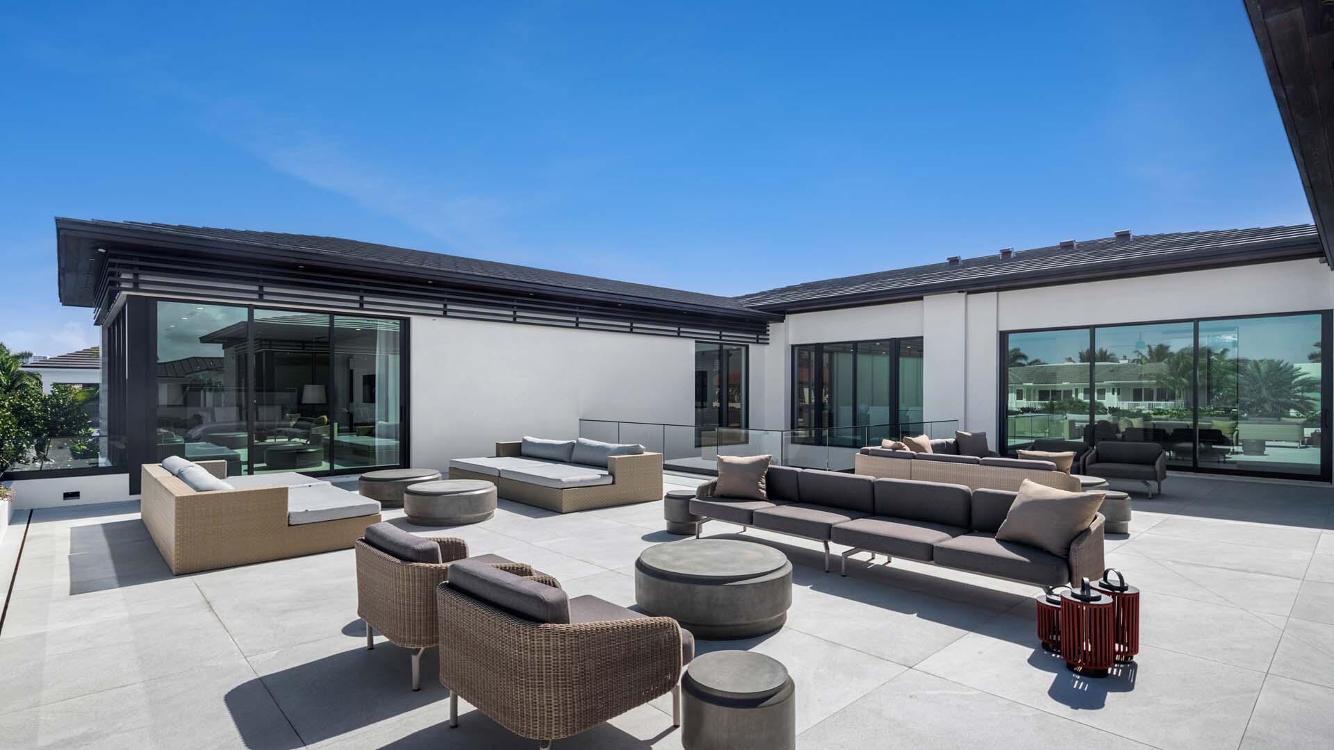 207 Coconut Palm Road Boca Raton, FL 33432 - Photo 47 of 62 a living room with furniture and a large window