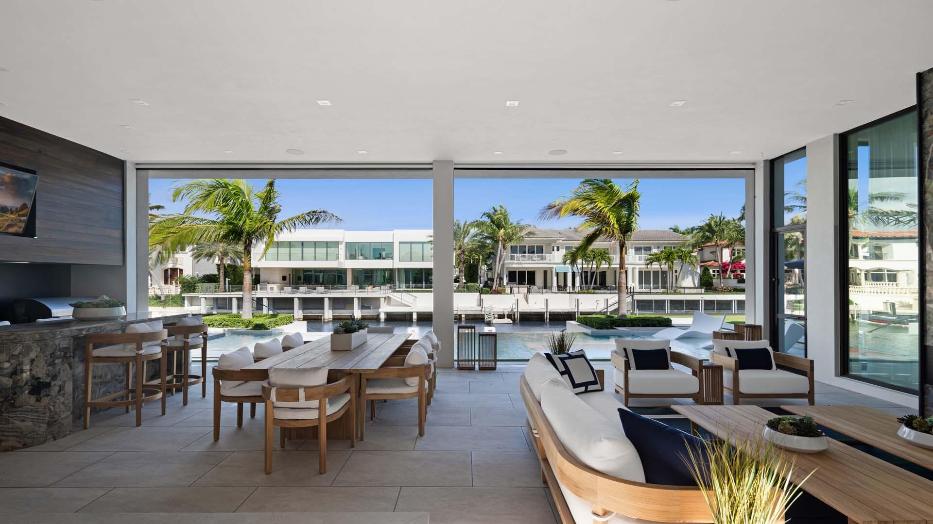 207 Coconut Palm Road Boca Raton, FL 33432 - Photo 48 of 62 a view of a dining room with furniture window and outside view