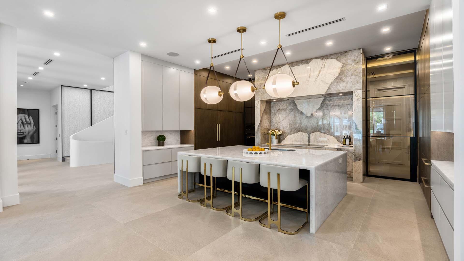 207 Coconut Palm Road Boca Raton, FL 33432 - Photo 6 of 62 a large kitchen with a table and chairs