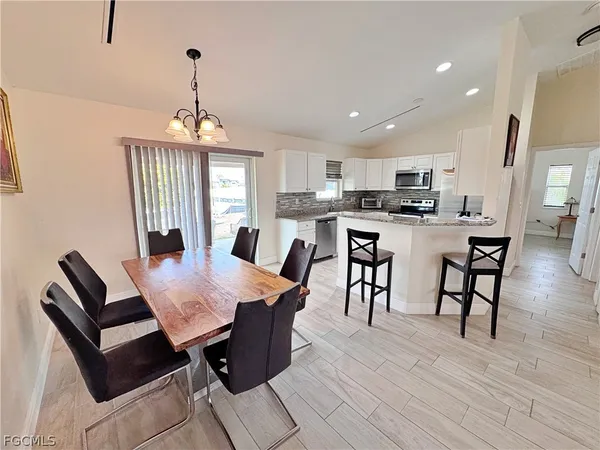 a view of a dining room with furniture