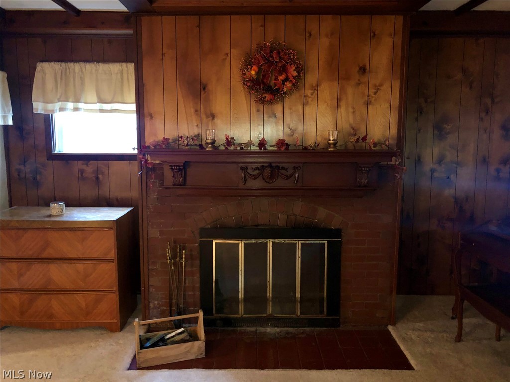 18220 Cornwall Road Cleveland, OH 44119 - Photo 5 of 22 Living room wood-burning fireplace.