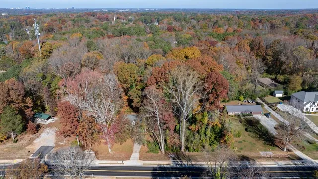 an aerial view of residential house with parking space