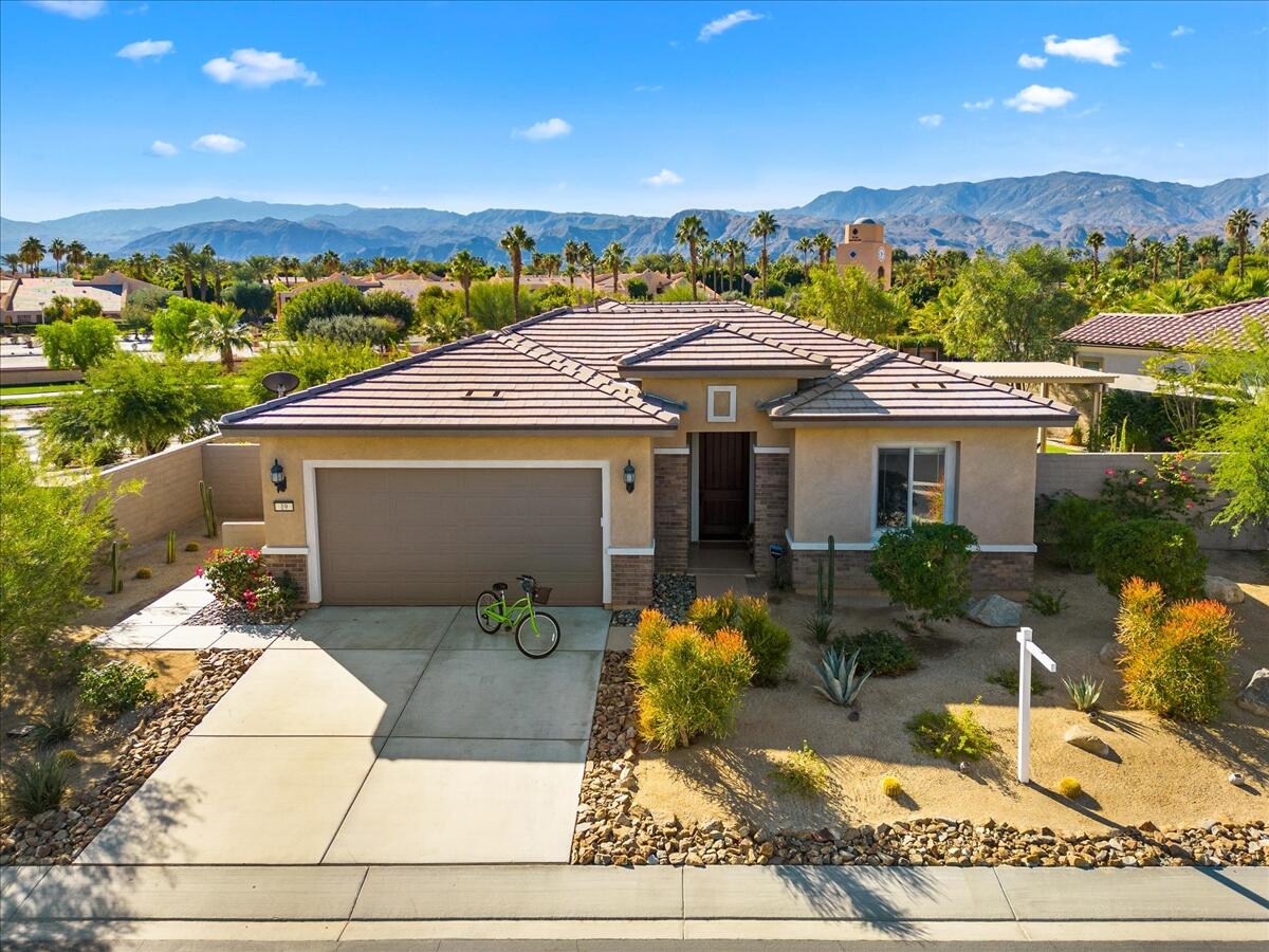 19 Syrah Rancho Mirage, CA 92270 - Photo 4 of 71 front view of a house with a porch