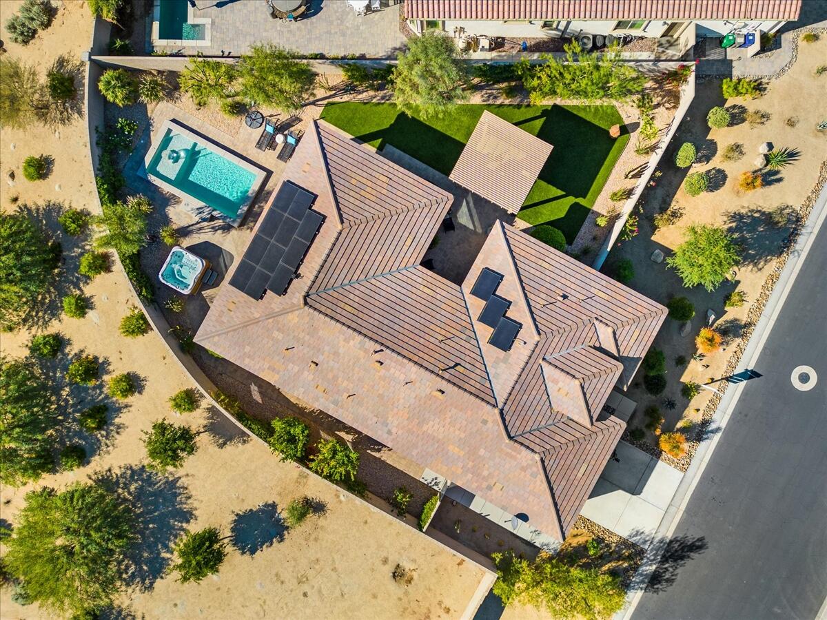 19 Syrah Rancho Mirage, CA 92270 - Photo 5 of 71 an aerial view of a house with a garden and mountain view