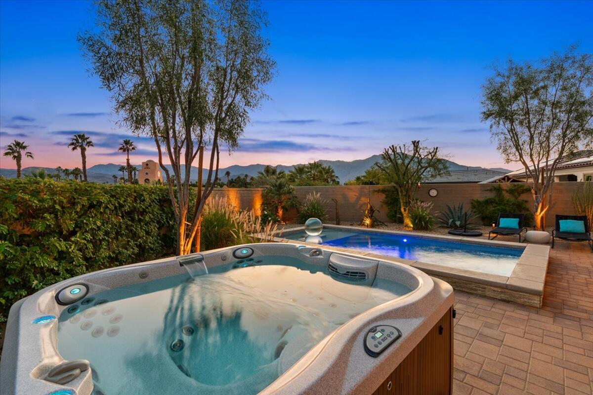 19 Syrah Rancho Mirage, CA 92270 - Photo 6 of 71 a view of swimming pool with outdoor seating and plants