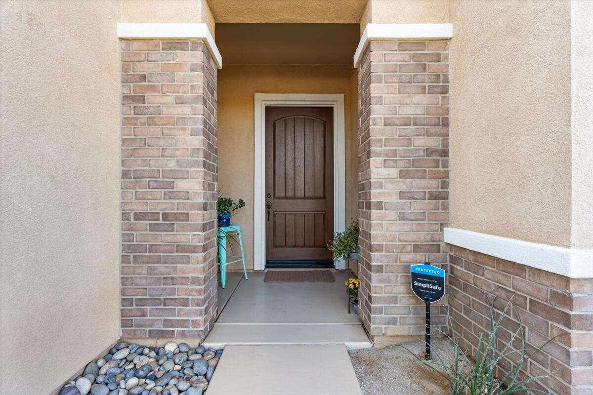 19 Syrah Rancho Mirage, CA 92270 - Photo 8 of 71 a view of an entrance door of the house