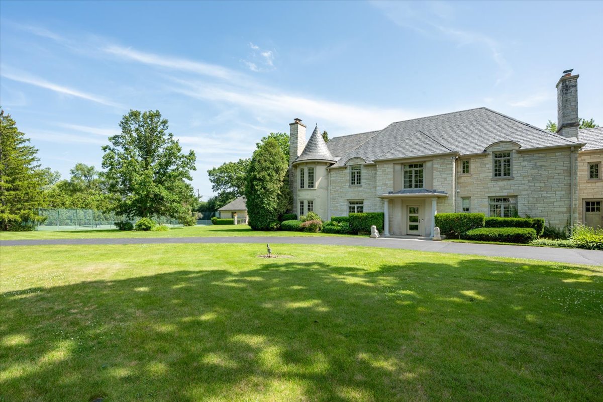 2311 Burr Oak Road Northfield, IL 60093 - Photo 66 of 69 a front view of a house with a yard