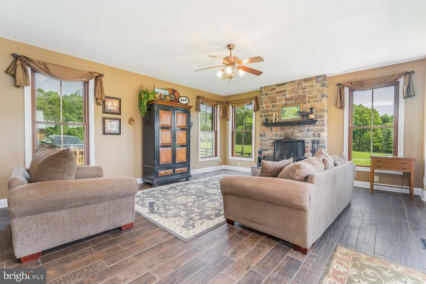 132 Ridge Road Timberville, VA 22853 - Photo 23 of 71 a living room with furniture and a fireplace