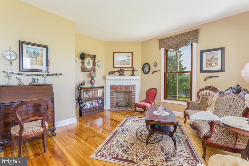 132 Ridge Road Timberville, VA 22853 - Photo 25 of 71 a living room with furniture and a fireplace