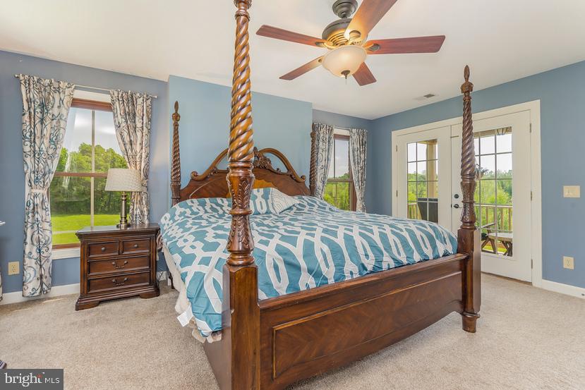 132 Ridge Road Timberville, VA 22853 - Photo 27 of 71 a bed sitting in a room next to a window