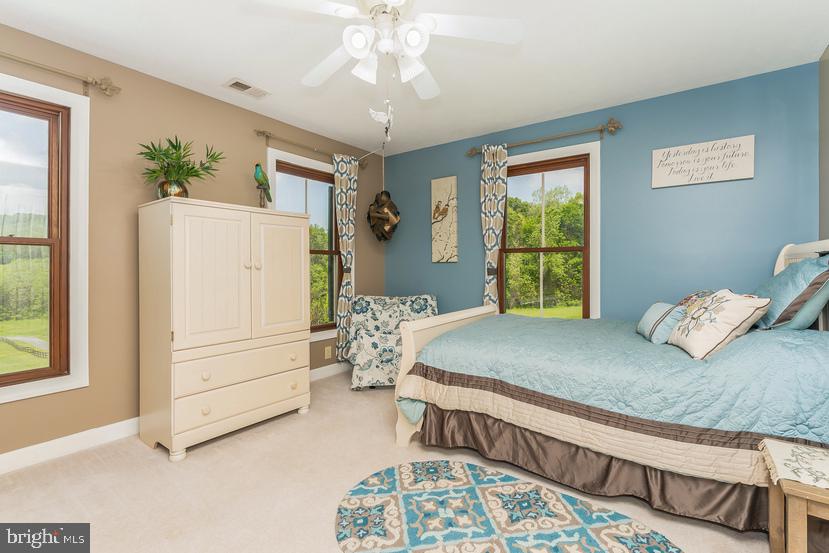 132 Ridge Road Timberville, VA 22853 - Photo 33 of 71 a bedroom with a bed and a window
