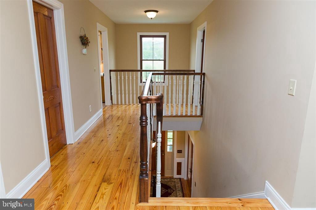132 Ridge Road Timberville, VA 22853 - Photo 38 of 71 a view of balcony with wooden floor