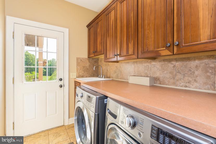 132 Ridge Road Timberville, VA 22853 - Photo 41 of 71 a utility room with dryer and washer