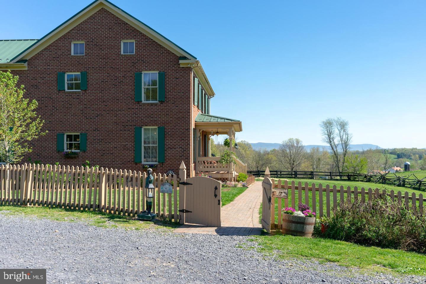 132 Ridge Road Timberville, VA 22853 - Photo 51 of 71 a front view of a house with a yard and fence