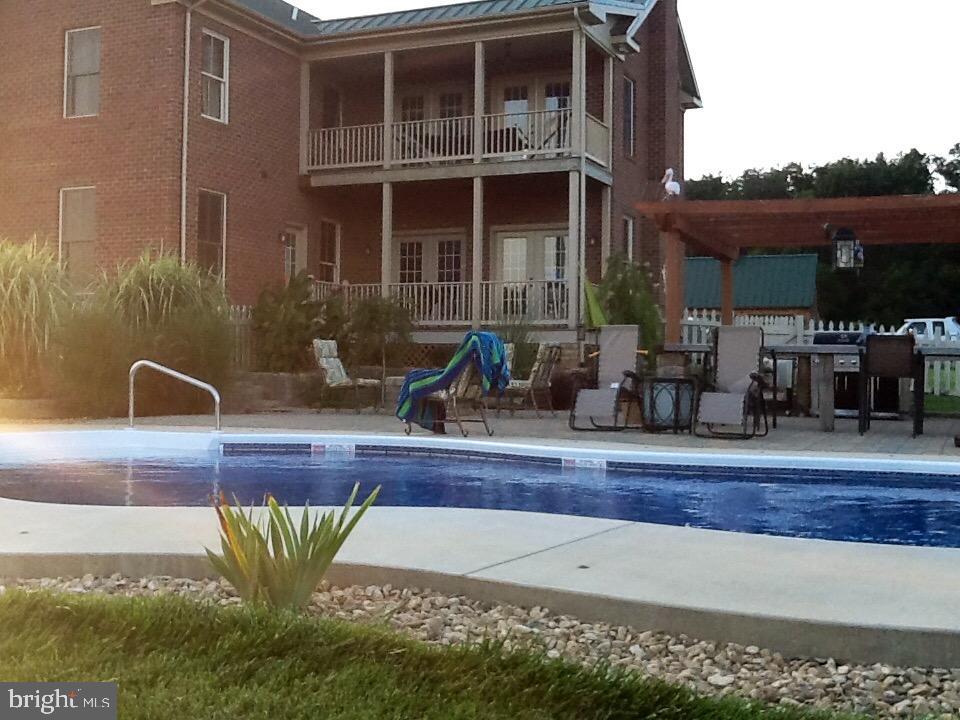 132 Ridge Road Timberville, VA 22853 - Photo 57 of 71 a view of pool with outdoor seating
