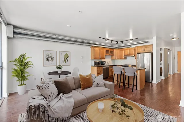 a living room with furniture and a table