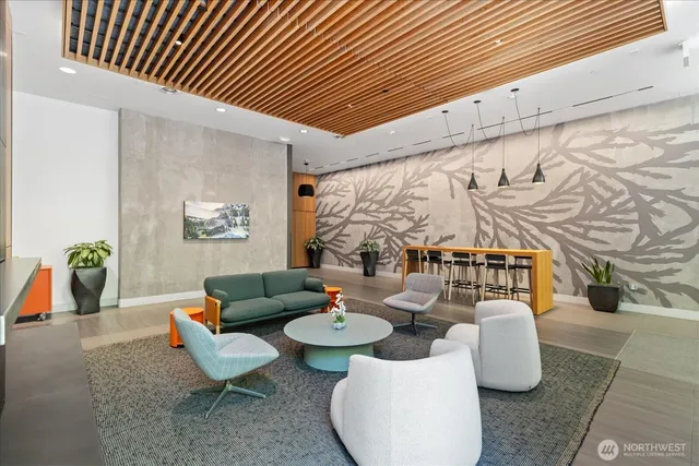 a living room with furniture and a table