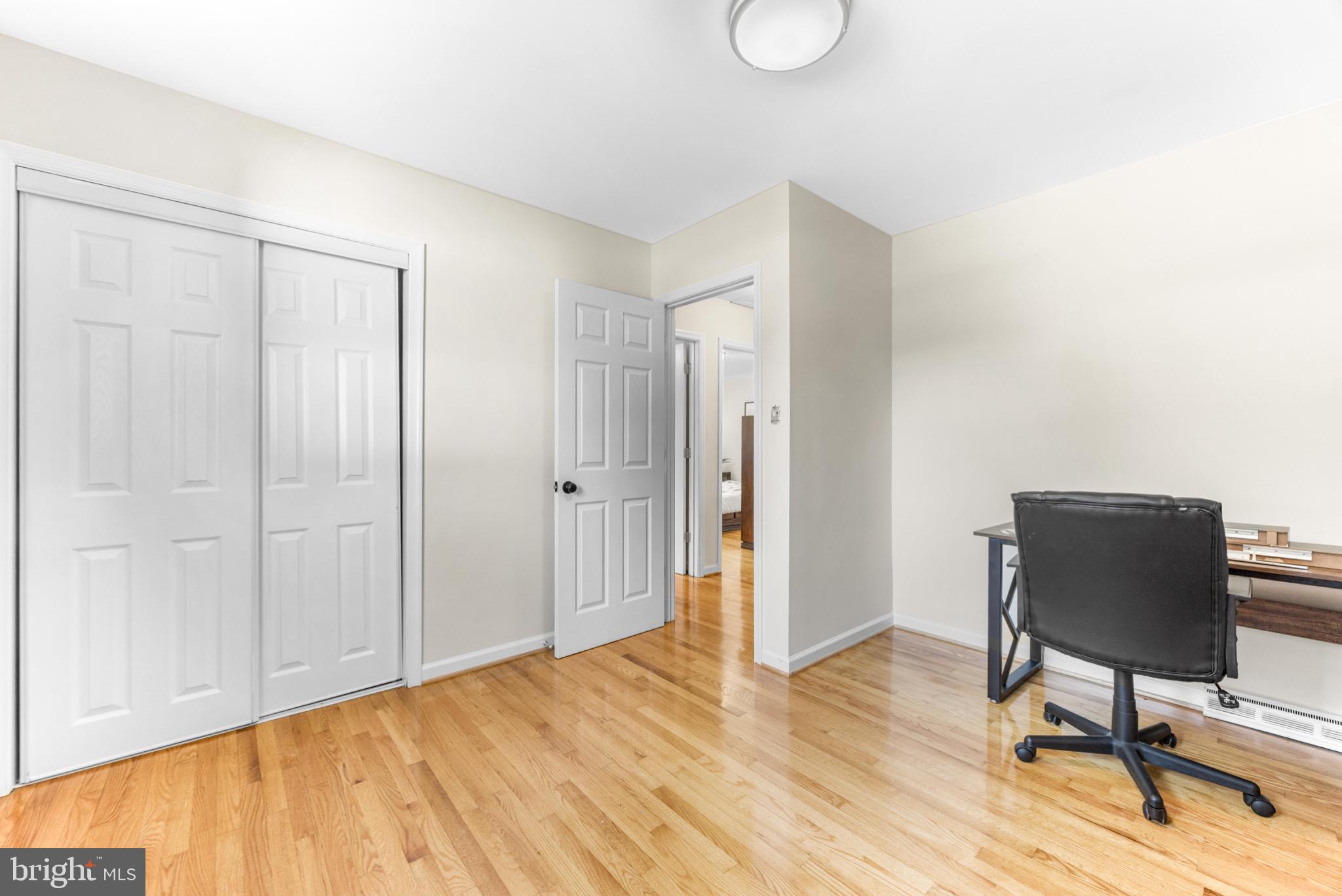 586 Forest View Road Linthicum Heights, MD 21090 - Photo 16 of 28 a view of a workspace with wooden floor