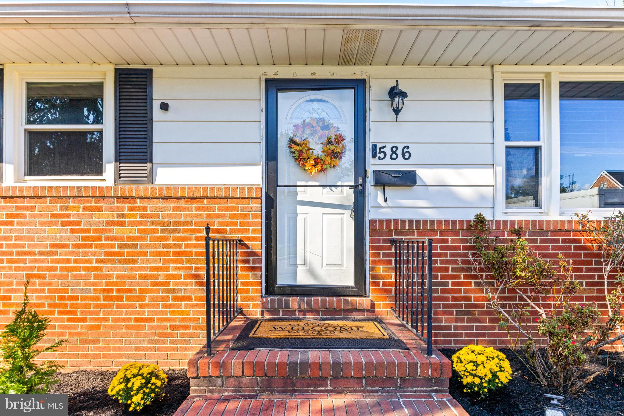 586 Forest View Road Linthicum Heights, MD 21090 - Photo 2 of 28 a view of door with a door