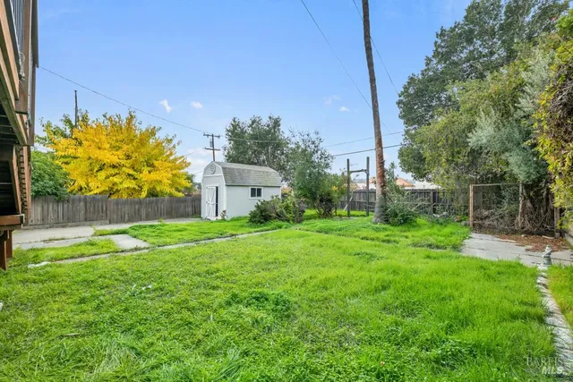 a house view with a garden space