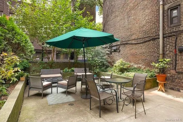a view of chair and tables in the patio