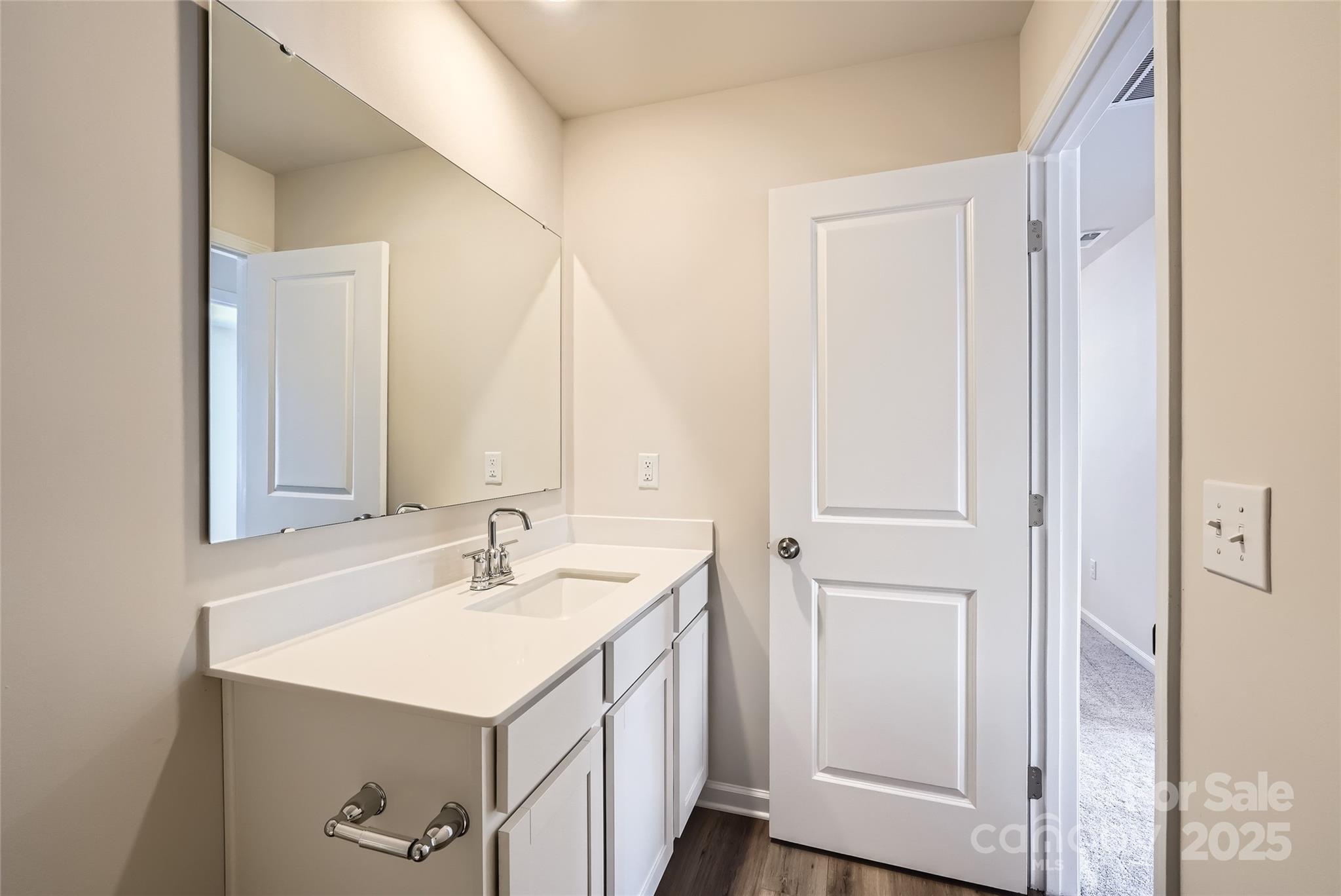 2482 Trollinger Drive Catawba, NC 28609 - Photo 11 of 14 a bathroom with a sink and a mirror