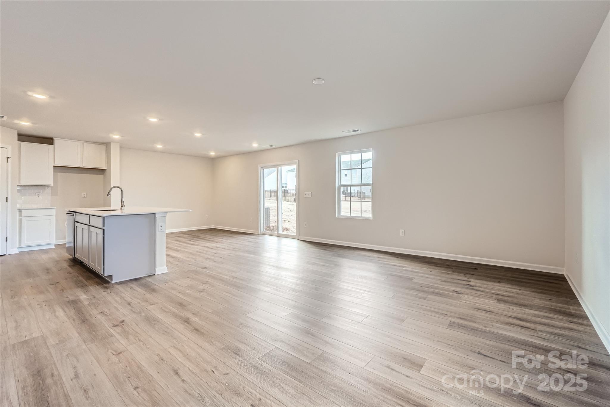 2482 Trollinger Drive Catawba, NC 28609 - Photo 6 of 14 a view of an empty room with wooden floor and a window
