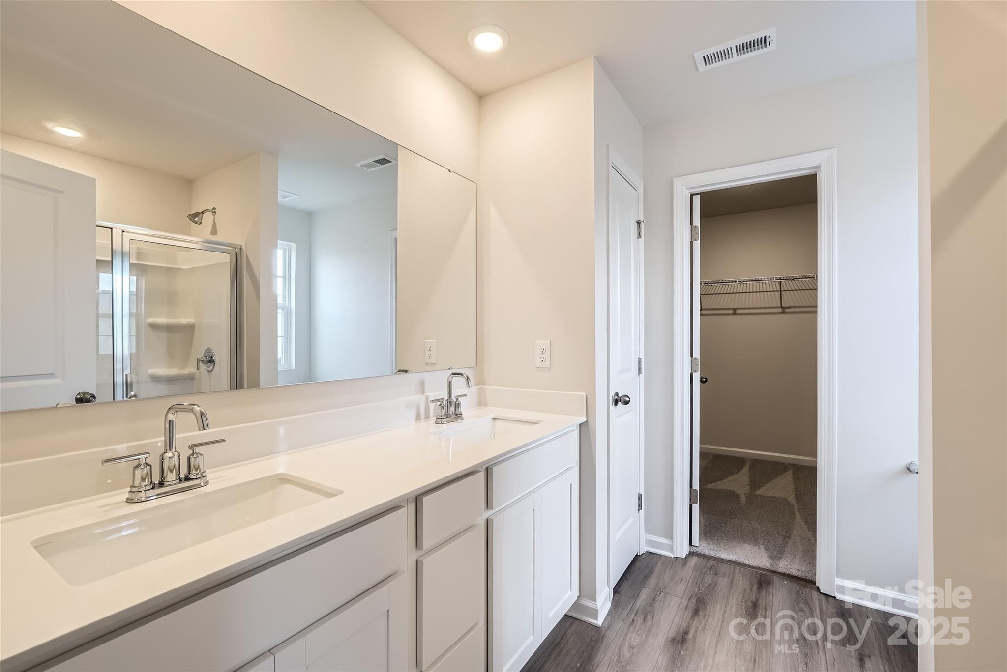 2482 Trollinger Drive Catawba, NC 28609 - Photo 8 of 14 a bathroom with a sink double vanity granite and a mirror