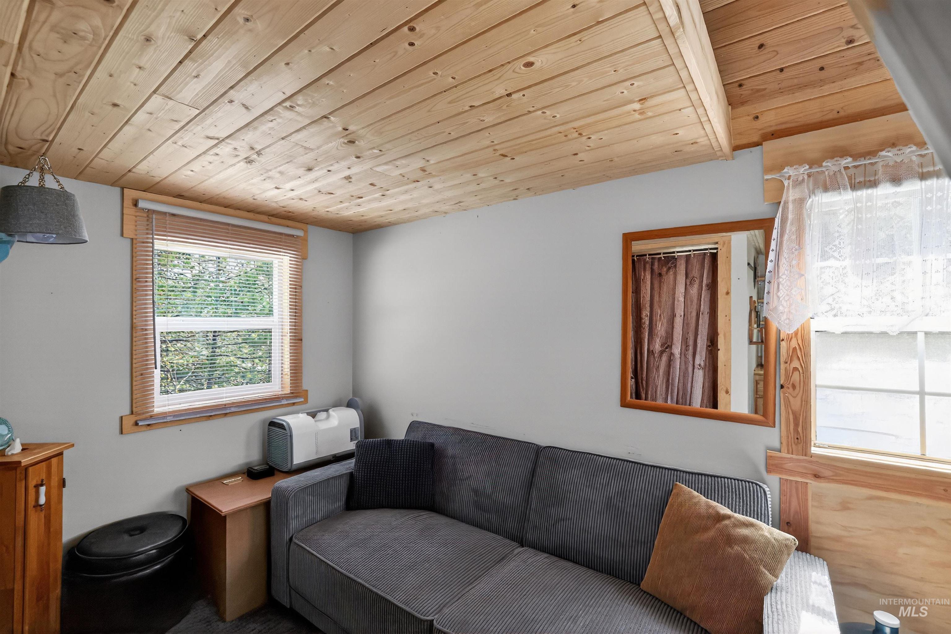 506 Hilltop Road Cascade, ID 83611 - Photo 10 of 36 Living area with wooden ceiling