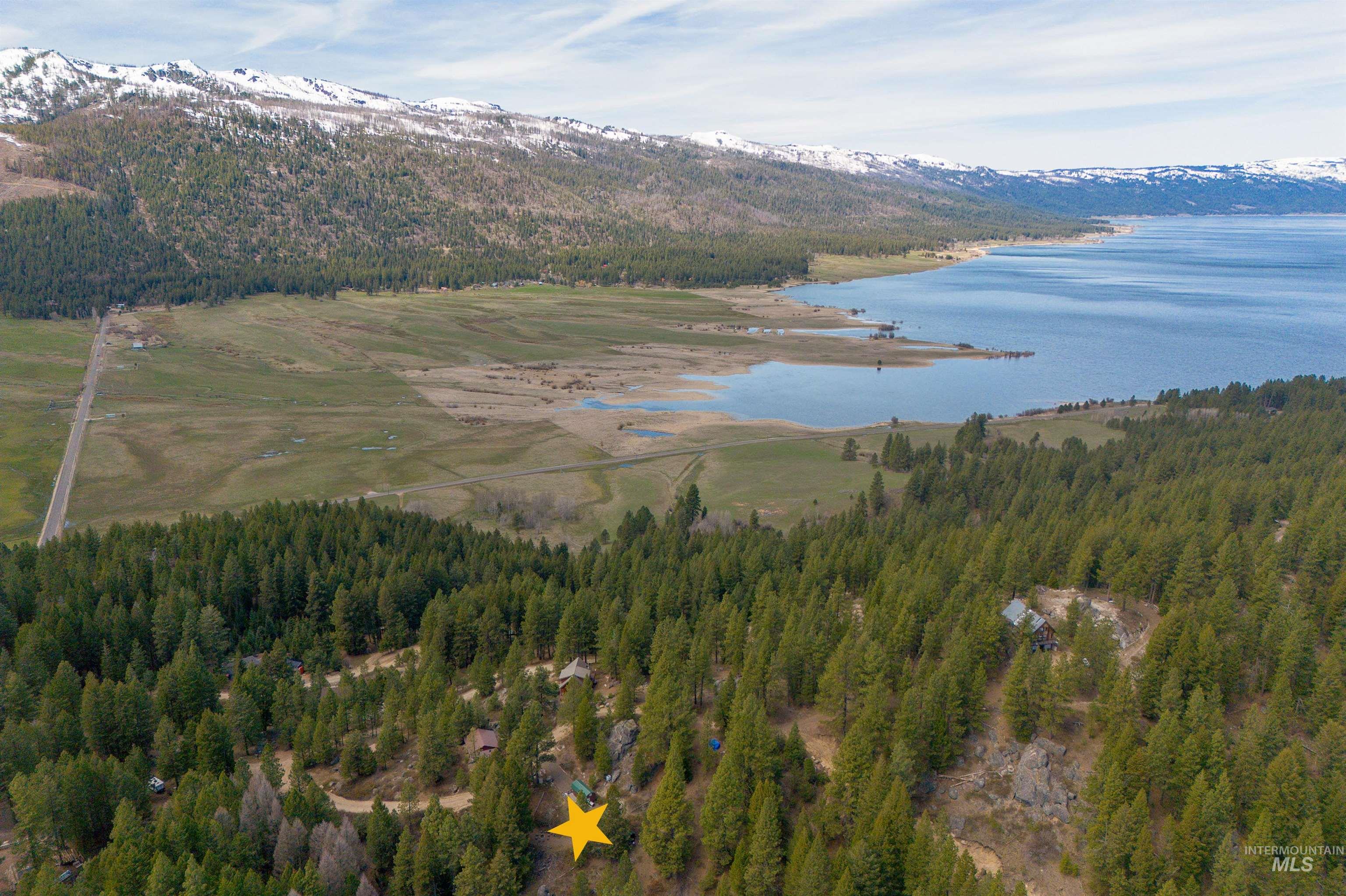506 Hilltop Road Cascade, ID 83611 - Photo 22 of 36 Aerial view of a water and mountain view and a heavily wooded area