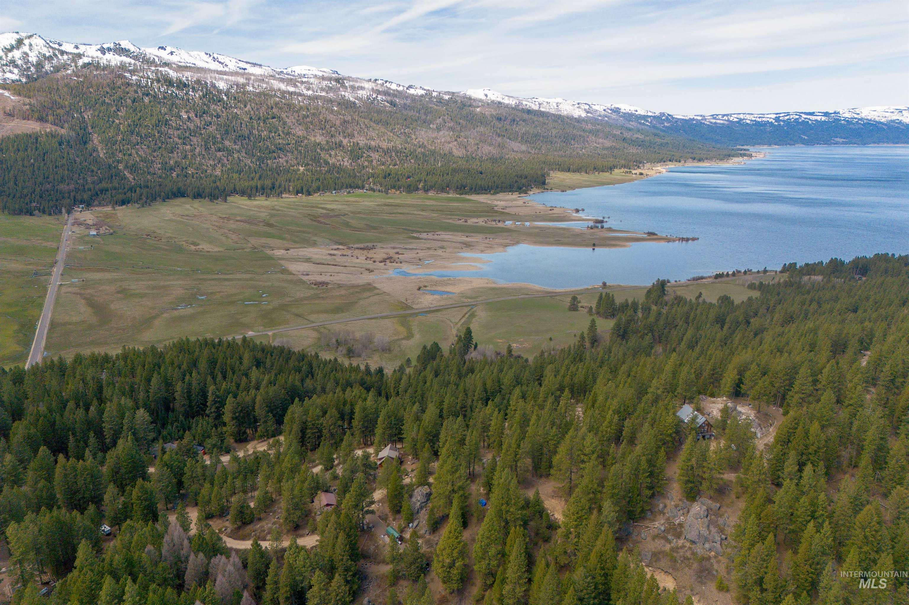 506 Hilltop Road Cascade, ID 83611 - Photo 23 of 36 Bird's eye view of a water and mountain view and a forest